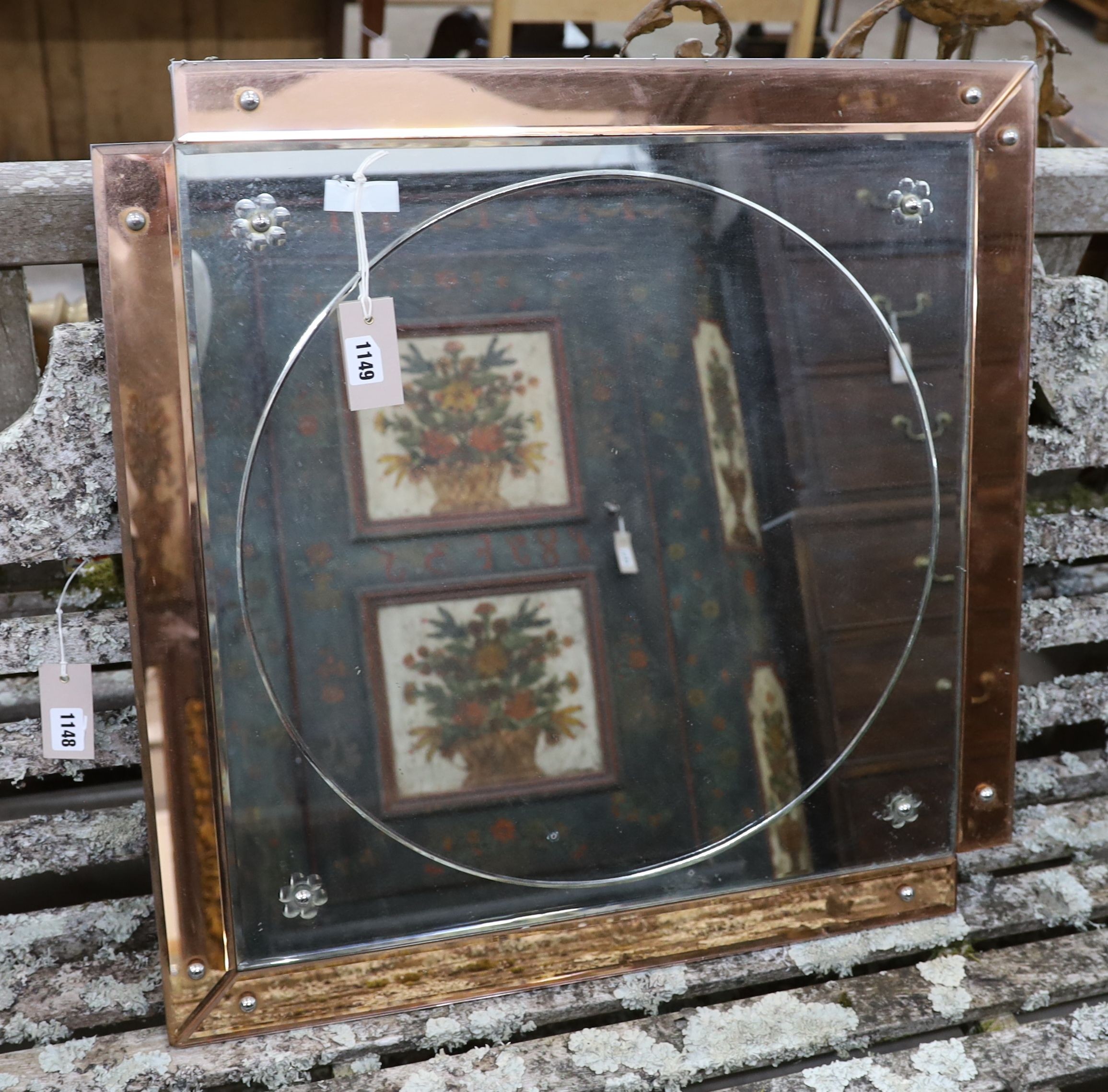 An Art Deco style peach and clear glass wall mirror, width 66cm, height 66cm